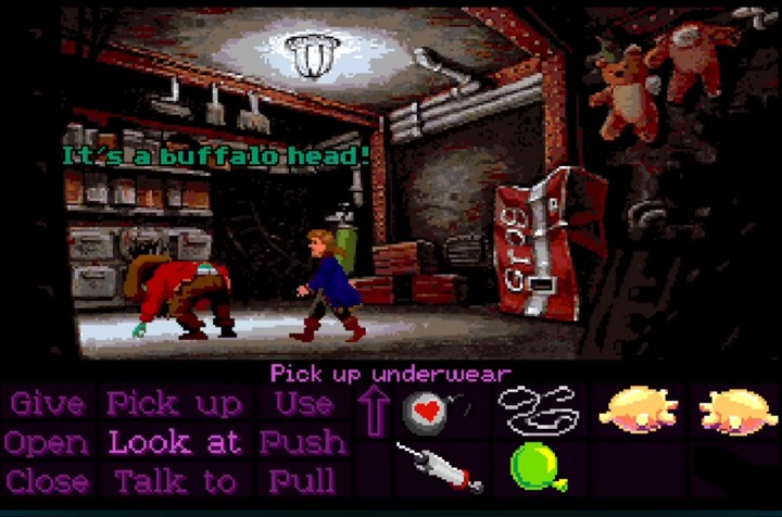 Guybrush talks with the ghost pirates aboard LeChuck's ship